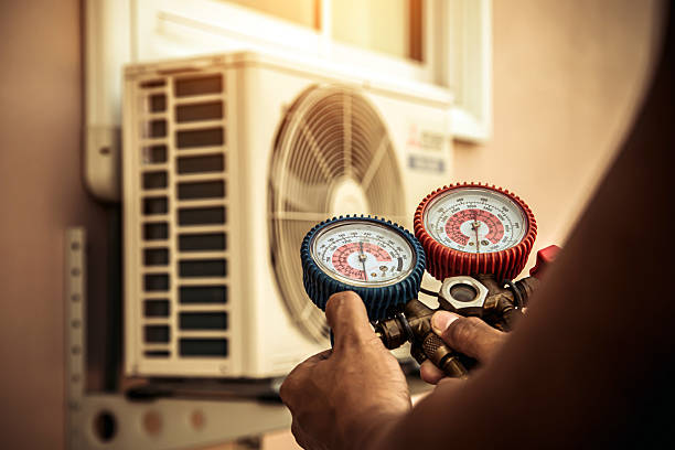 Professional Hvac technician working in Prather, CA